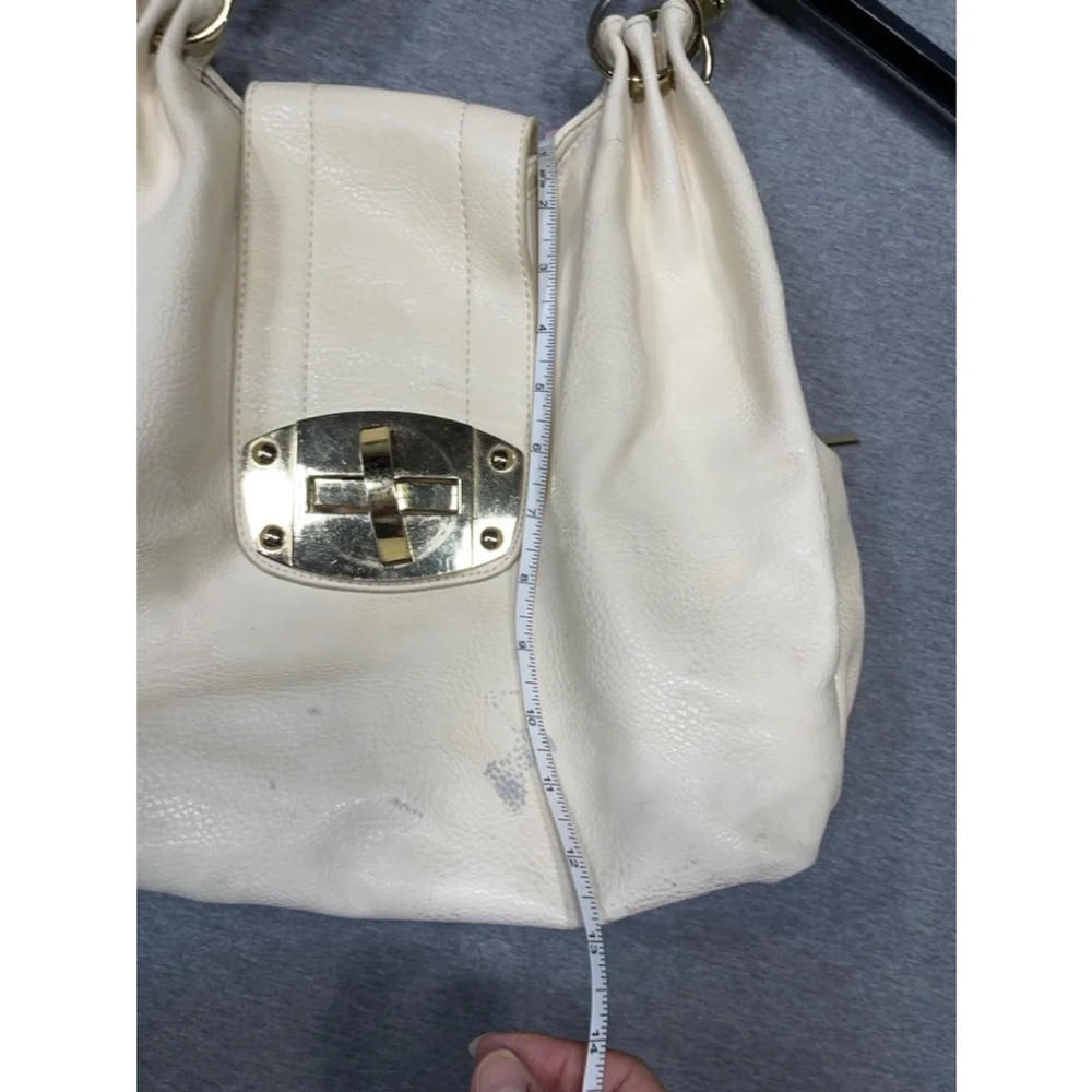 Charming Charlies cream and gold Handbag